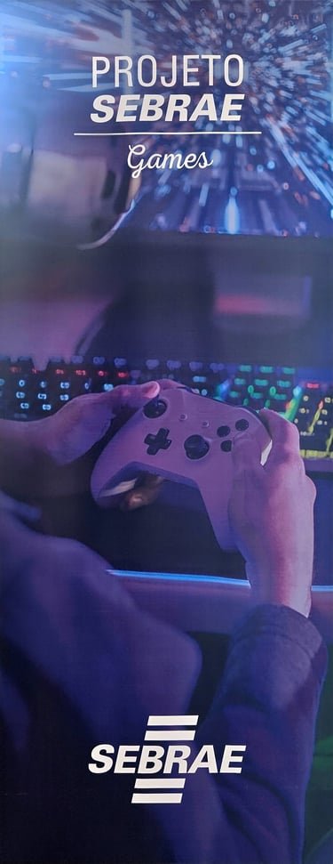 Alunos concentrados desenvolvendo projetos de jogos digitais